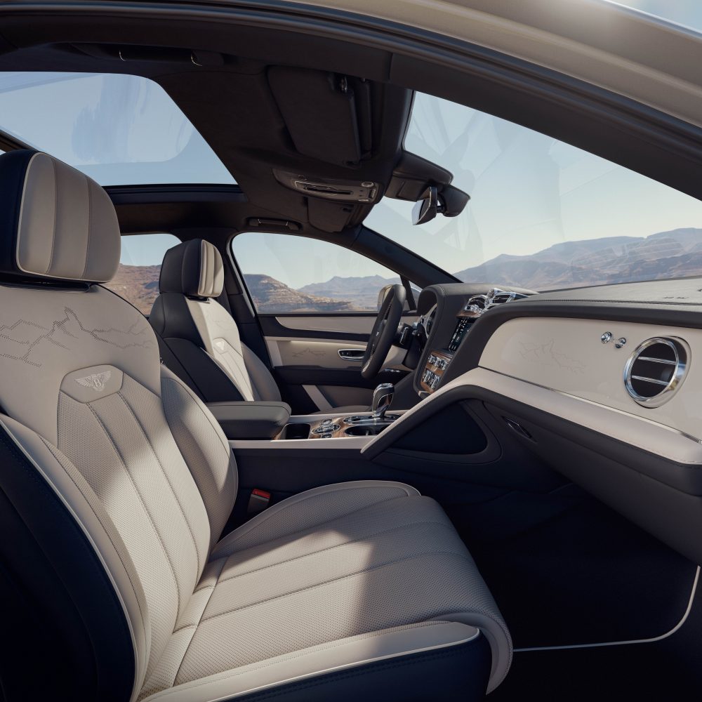 Laser-crafted seat perforations inspired by mountain motif 